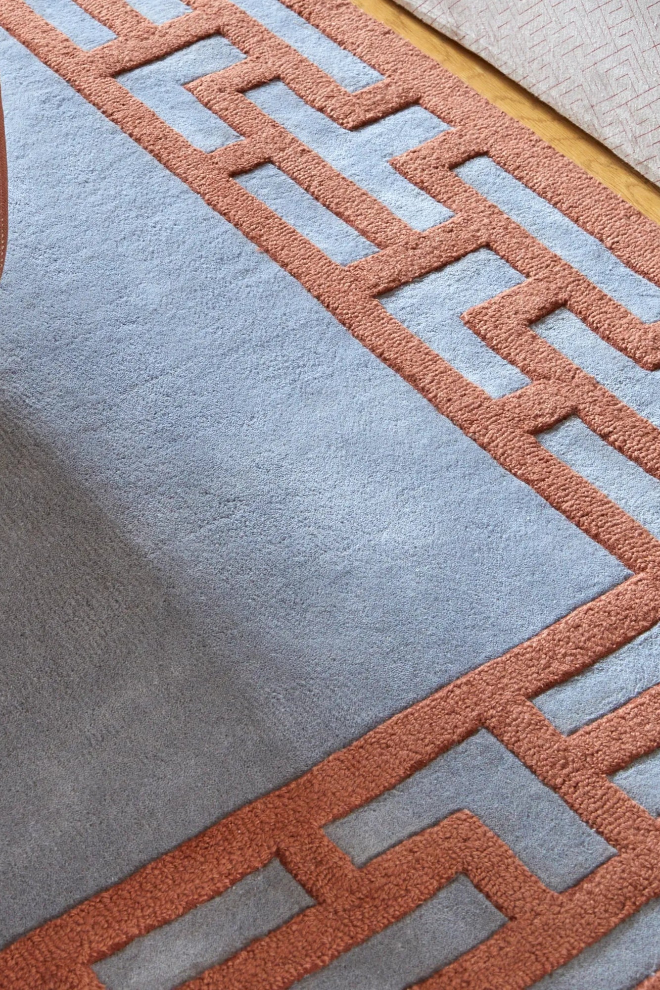 Handcrafted Indocine Wool Rug with traditional motifs, ideal for adding warmth to any space