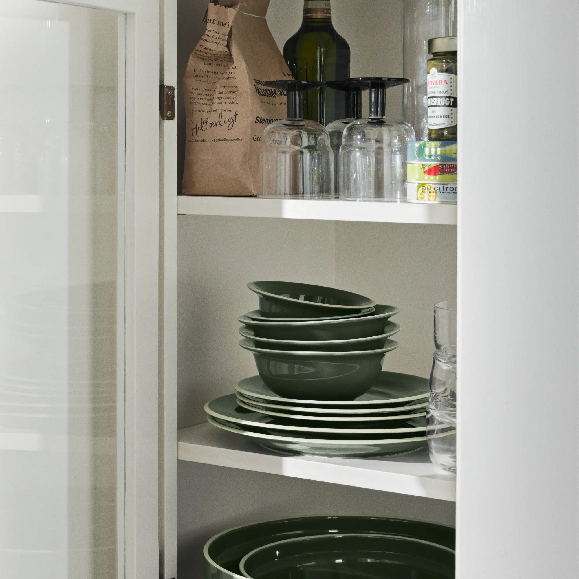 Beautifully crafted Taverna Dinner Set for 4, including 4 dinner plates, 4 salad plates, 4 bowls, and 4 mugs with Mediterranean-inspired patterns