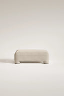 Beige ottoman on a light beige background