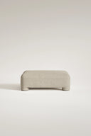 Beige ottoman on a light beige background