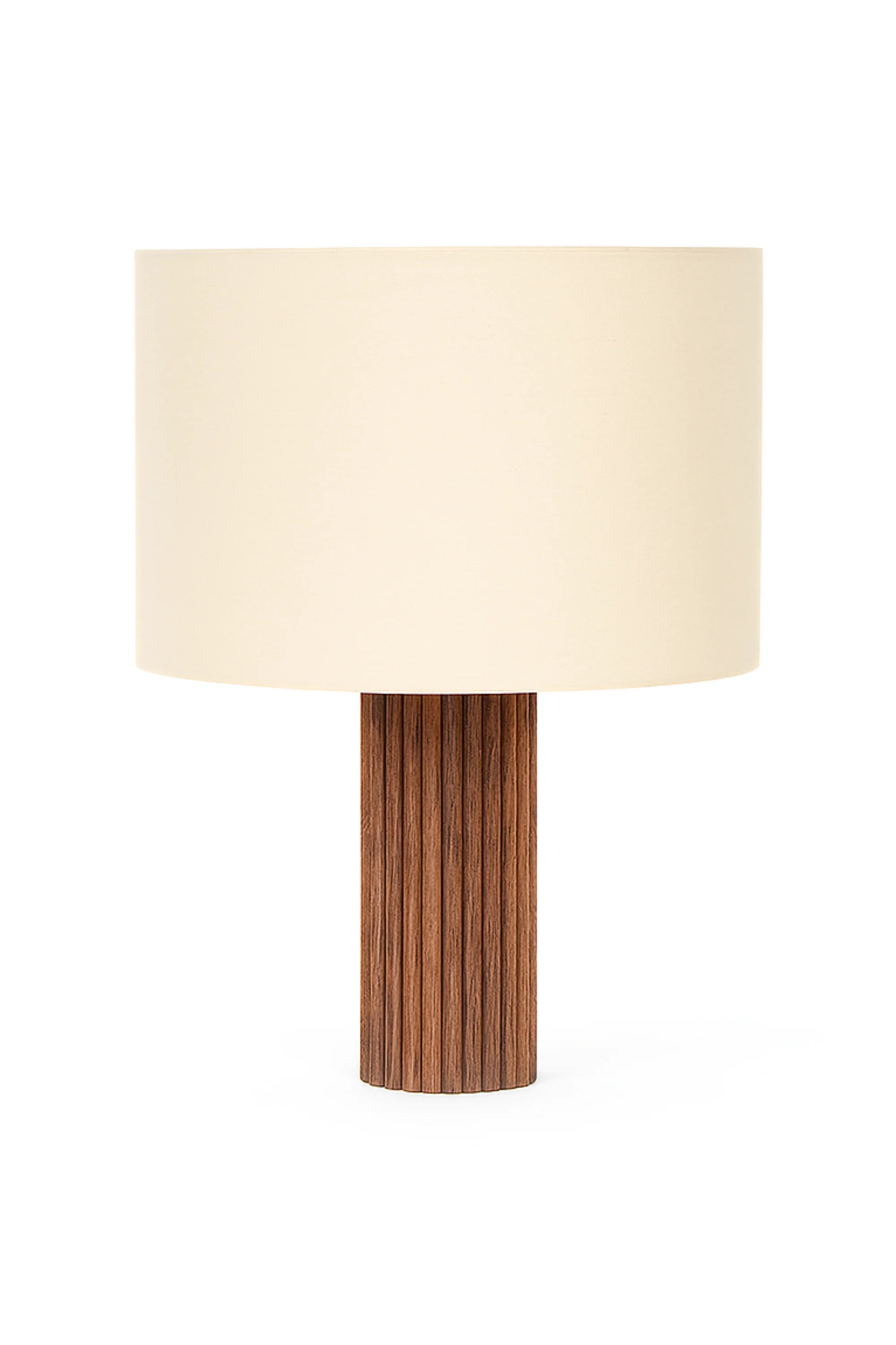 Table lamp with a wooden base and beige fabric shade on a white background