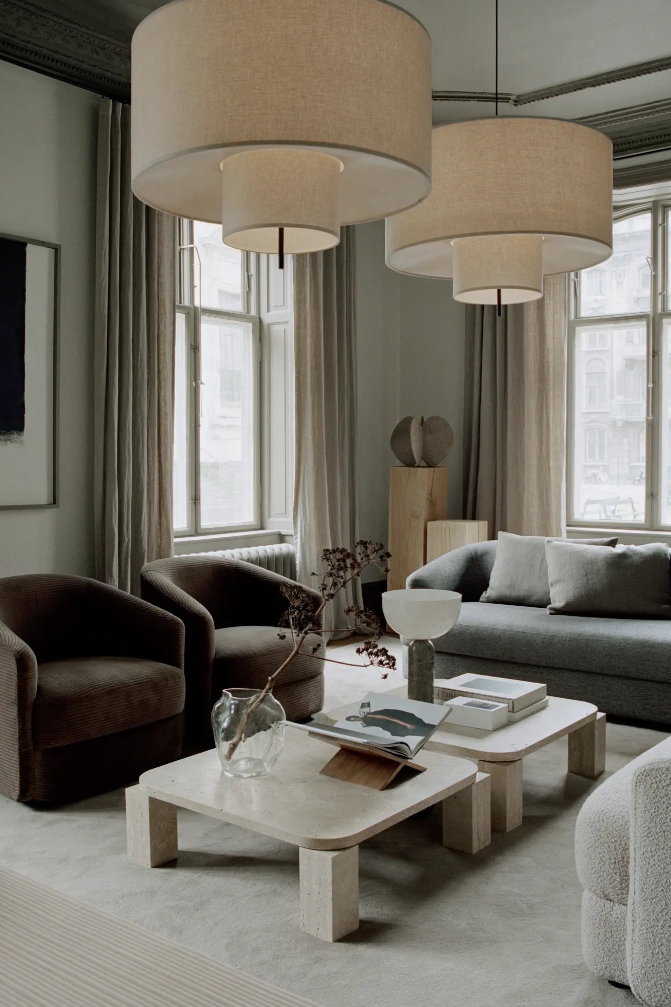 Elegant and durable Atlas Coffee Table 60x60 - Travertine with a square travertine stone top and sturdy metal base