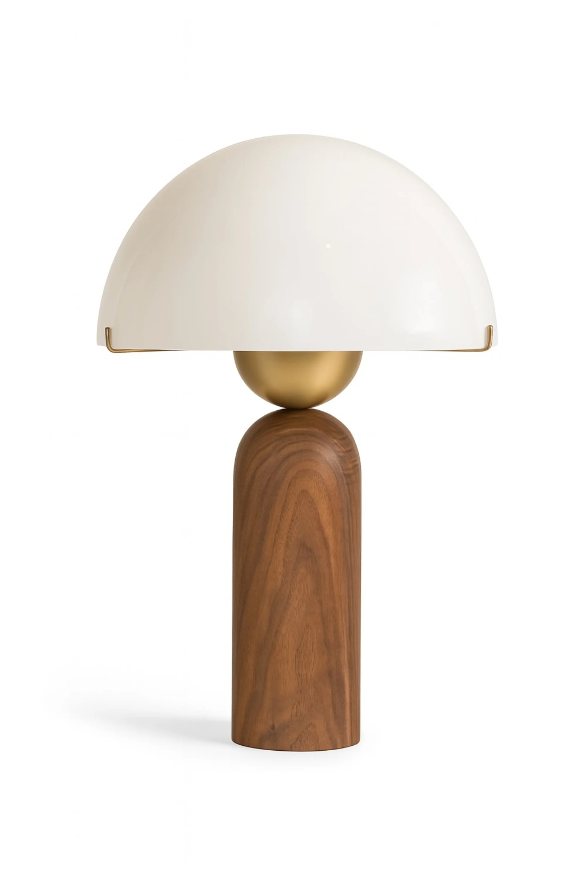 Table lamp with wooden base, gold accent, and white shade on a white background