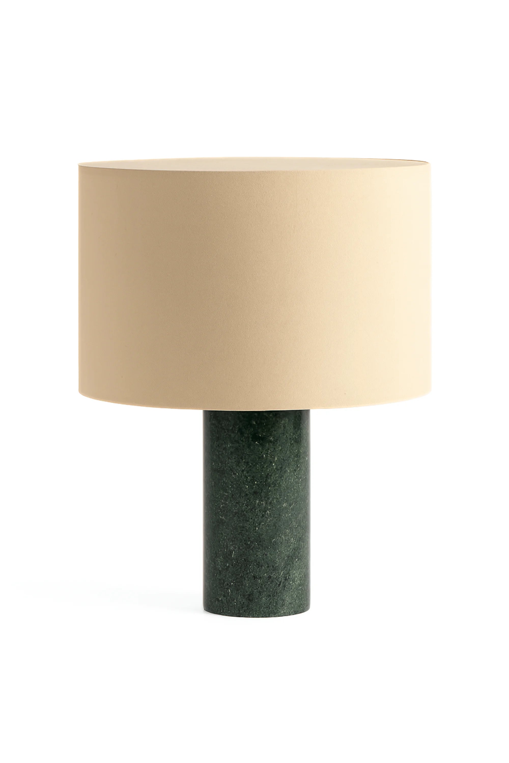 Table lamp with beige shade and green base on a white background