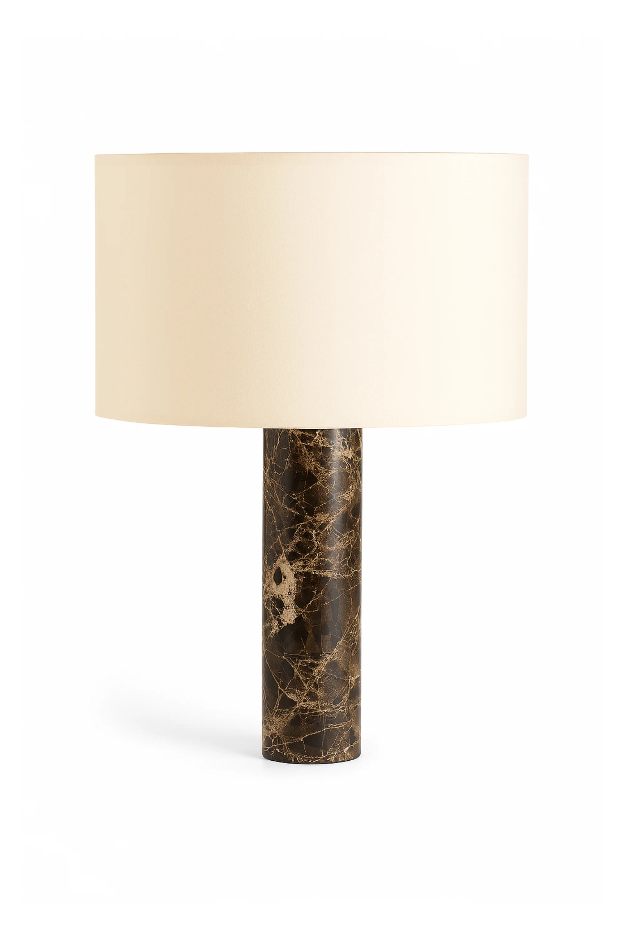 Table lamp with a marble base and beige lampshade on a white background