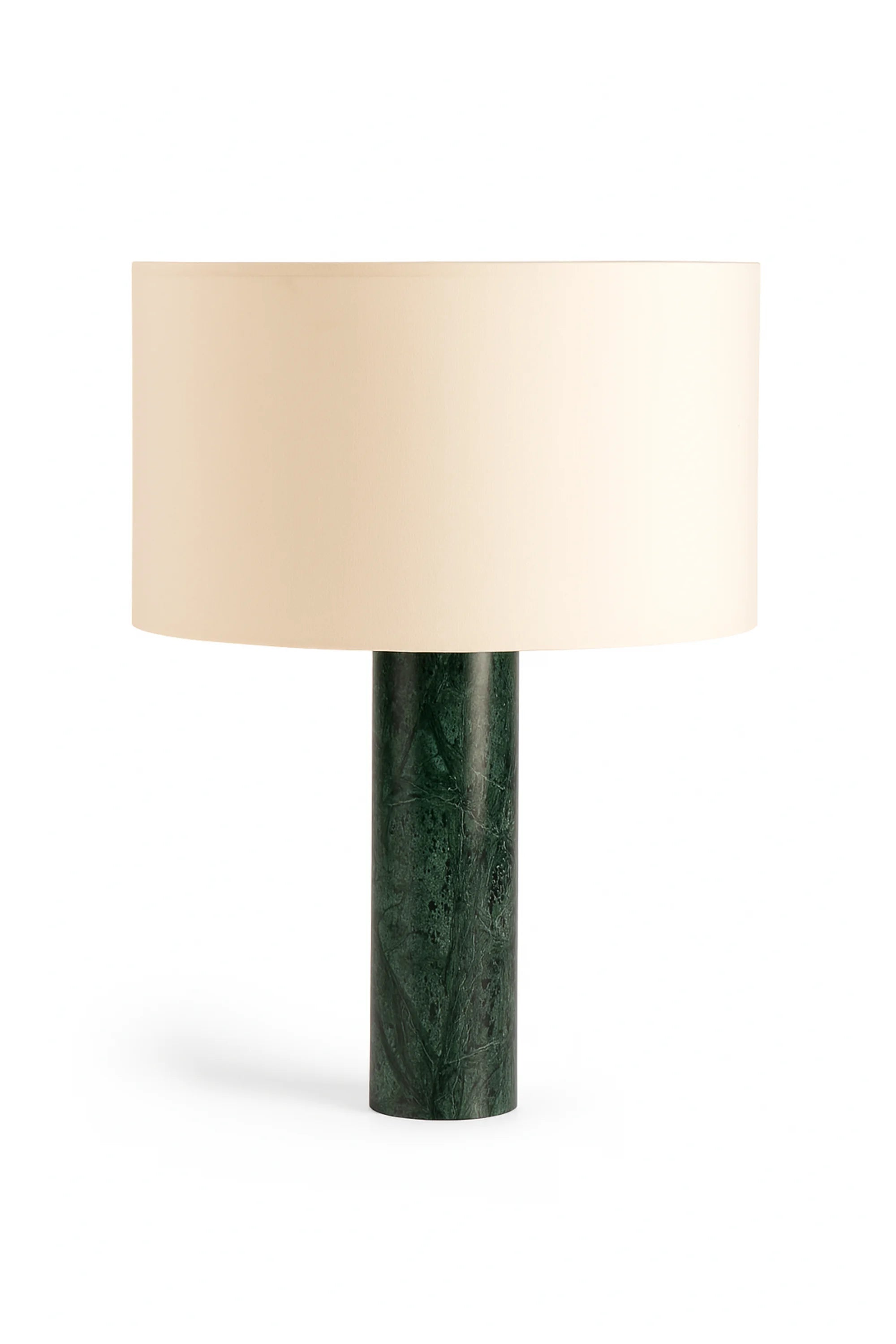 Table lamp with a green marble base and beige lampshade on a white background