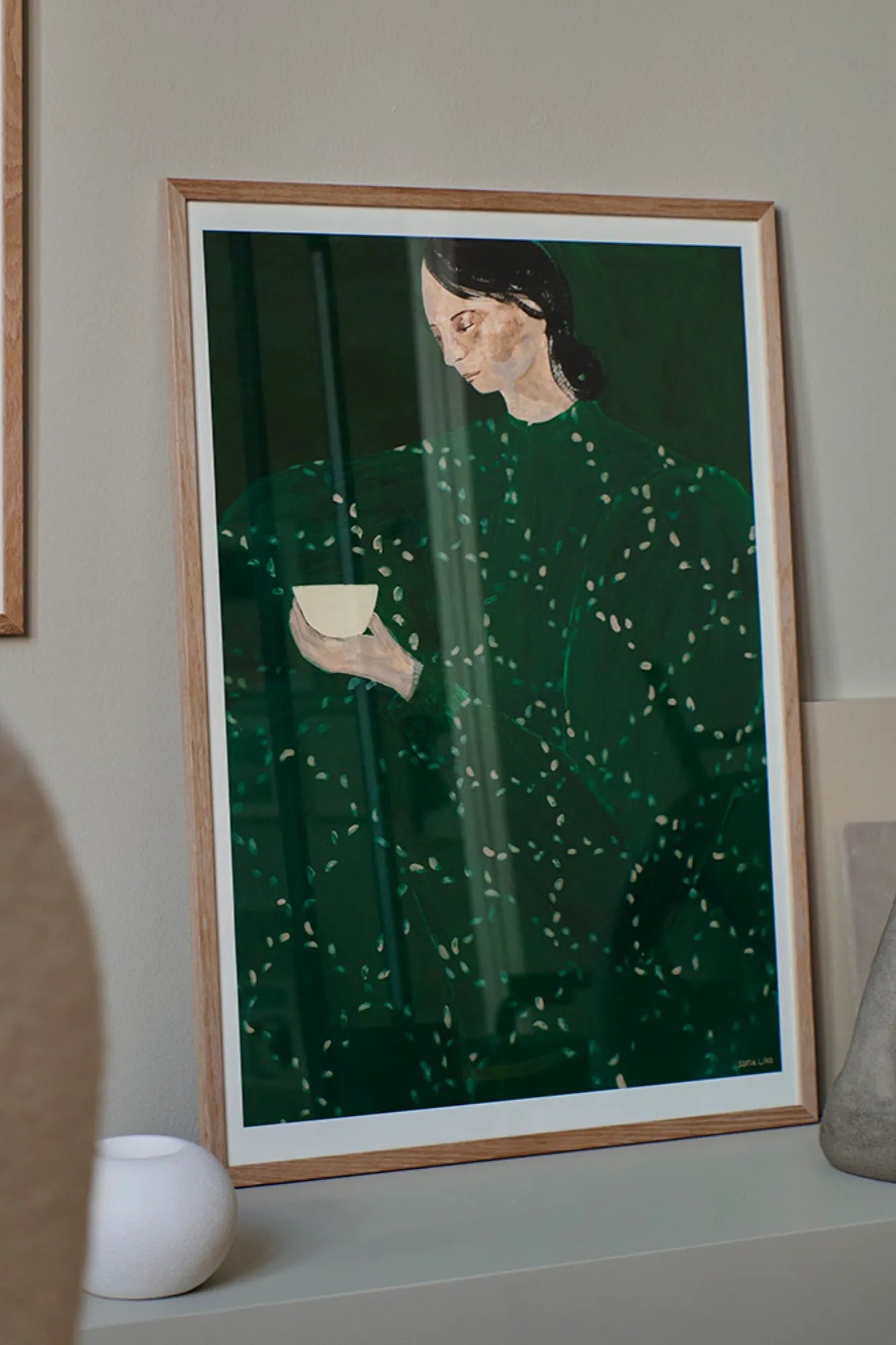 A close-up of a steaming cup of rich espresso on a rustic table