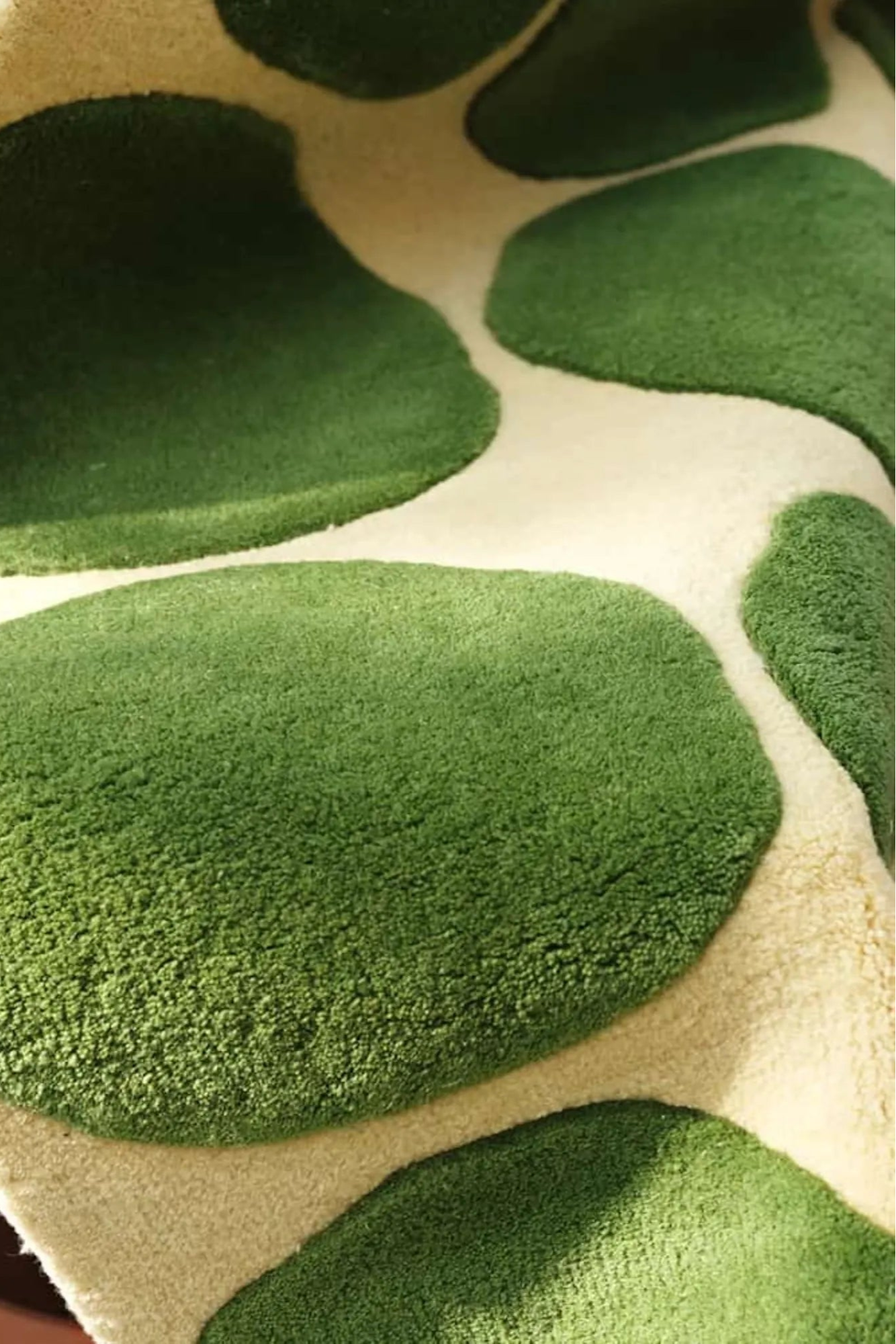 Dots 2 Wool Rug displayed in a modern living room, showcasing its elegant and versatile design