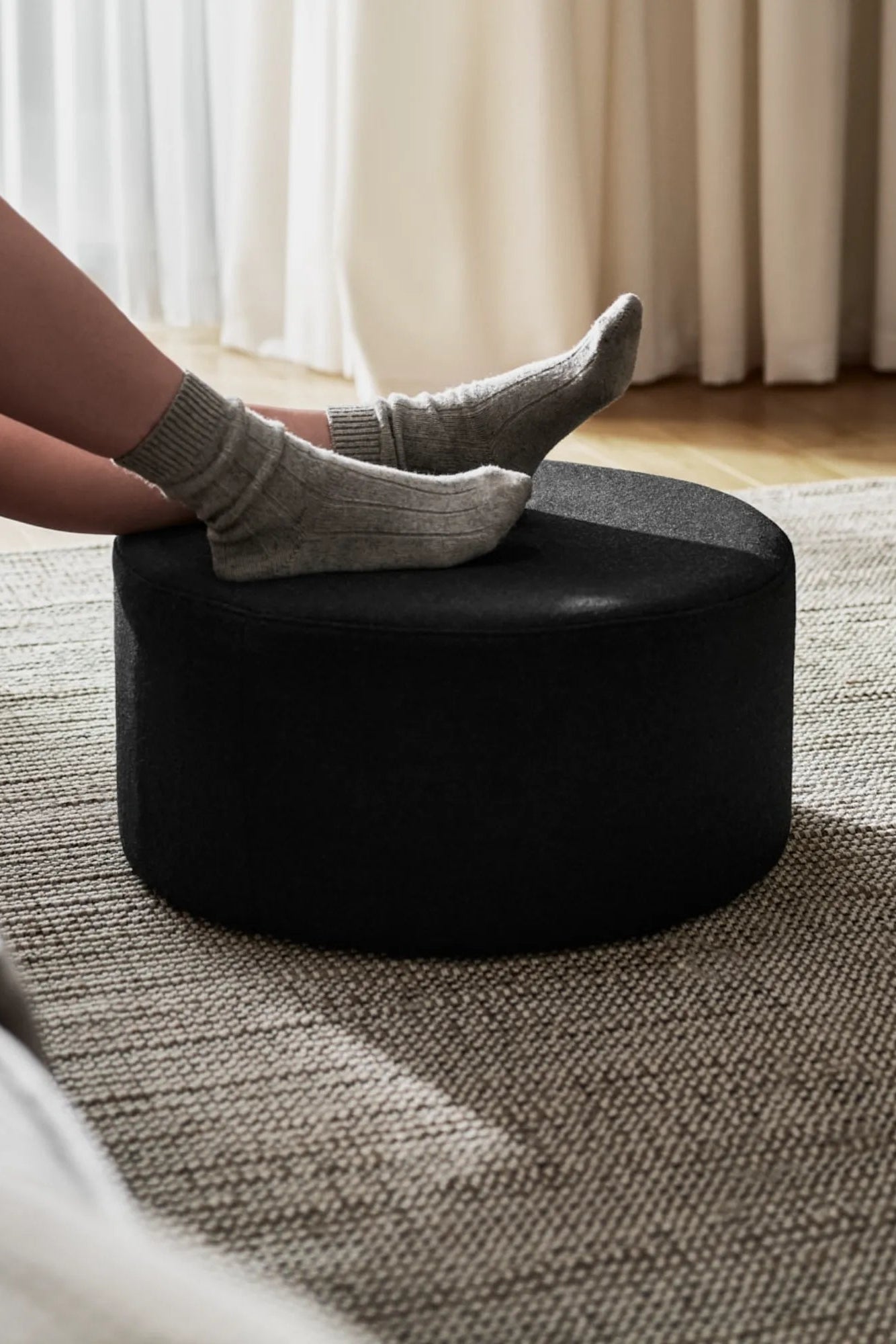 Handcrafted Folk Pouf - Low with tassel details and earthy tones