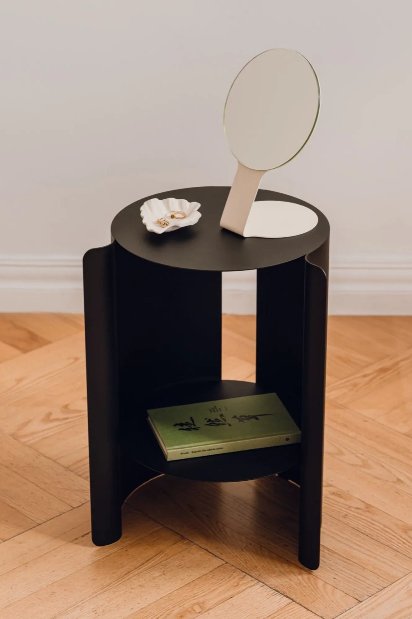 Modern and elegant Wa Side Table with a sleek white marble top and slender gold legs, perfect for contemporary living spaces