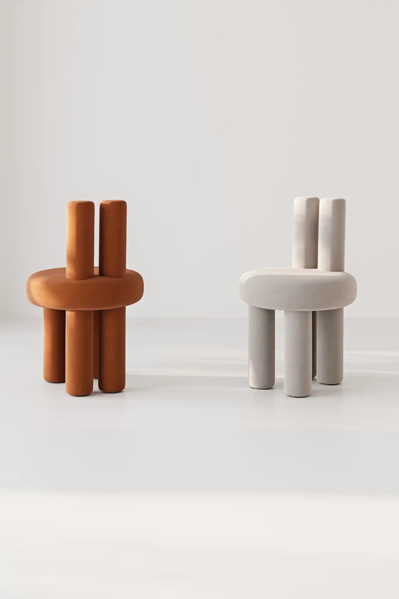 Elegant white Salvador Chair with cushioned seat and backrest, featuring solid wood legs and stylish curved design