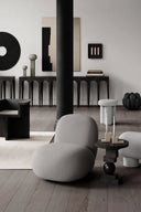 Comfortable flat toe lounge chair with wide seat and padded armrests