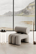 Side view of Foku Lounge Chair with sleek and minimalist design