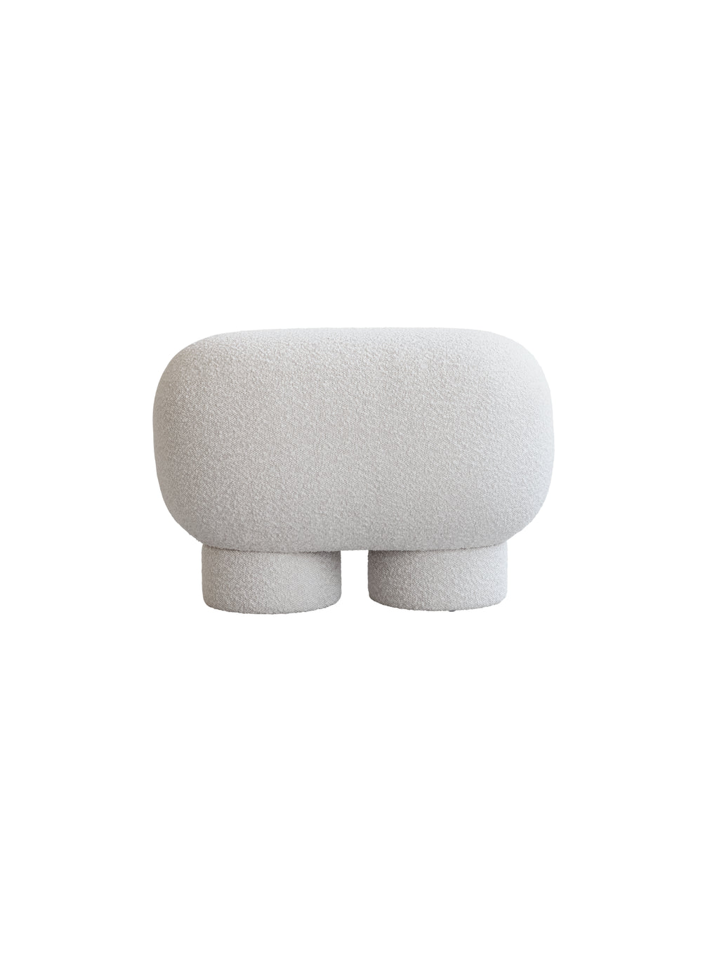 101 CPH Petit Big Foot Bench - Boucle. A light gray, minimalist, cylindrical boucle upholstered bench with two rounded legs, viewed head-on against a white background. This luxury furniture piece is perfect for contemporary interiors.