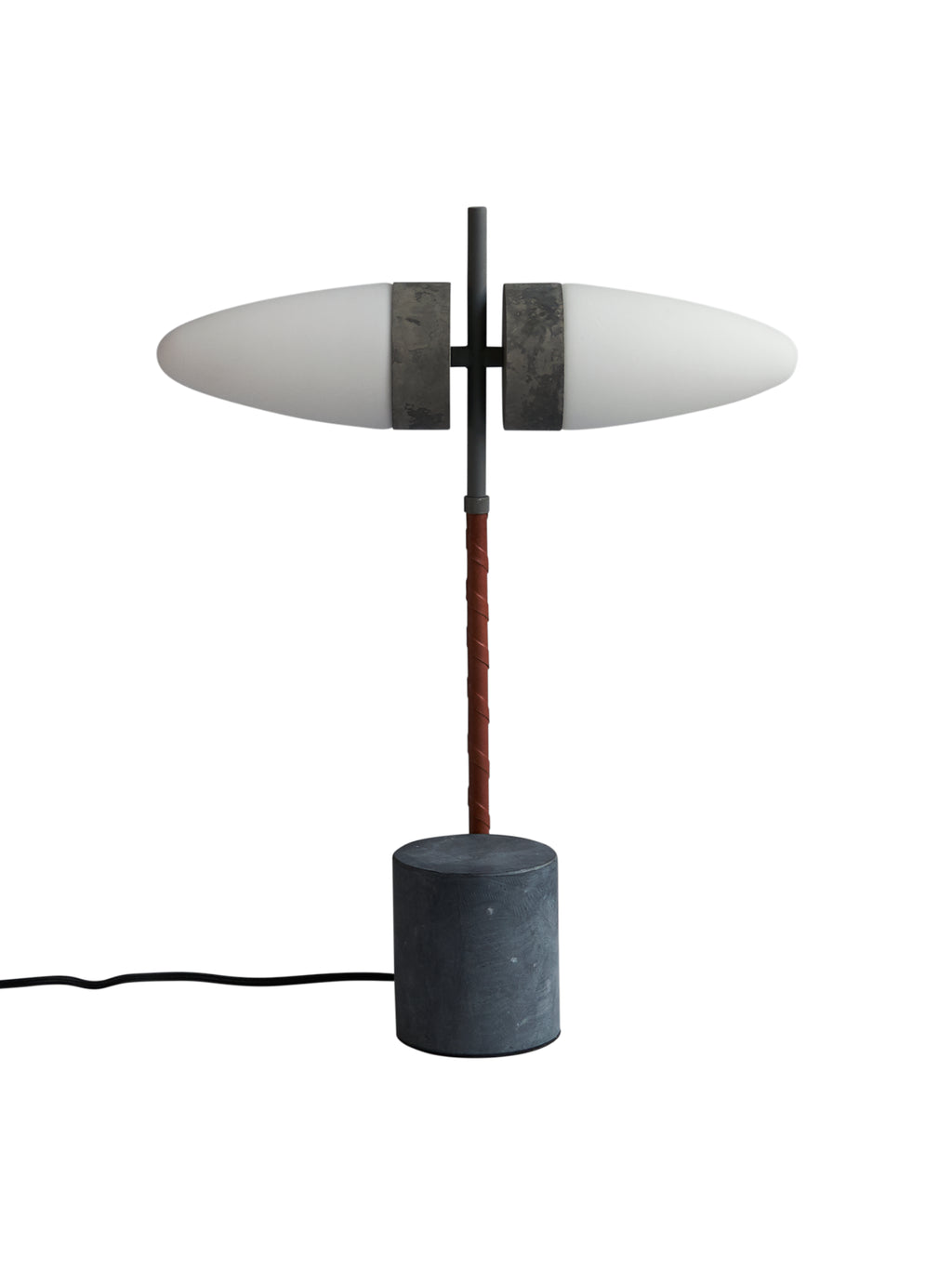 101 CPH Bull Table Lamp against a white background, featuring a dark gray cylindrical base, a brown braided leather stem, and two horizontal frosted white glass shades with industrial dark gray metal accents. A statement piece for modern interiors.