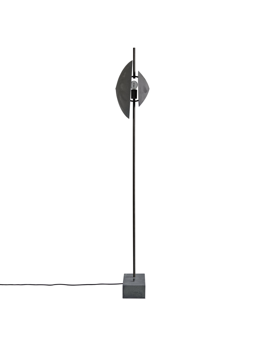 101 CPH Dawn Floor Lamp in a flat lay. This minimalist luxury lamp features a dark grey concrete base and black metal stand with a unique spherical metal shade partially obscuring the light bulb, offering ambient industrial modern illumination.