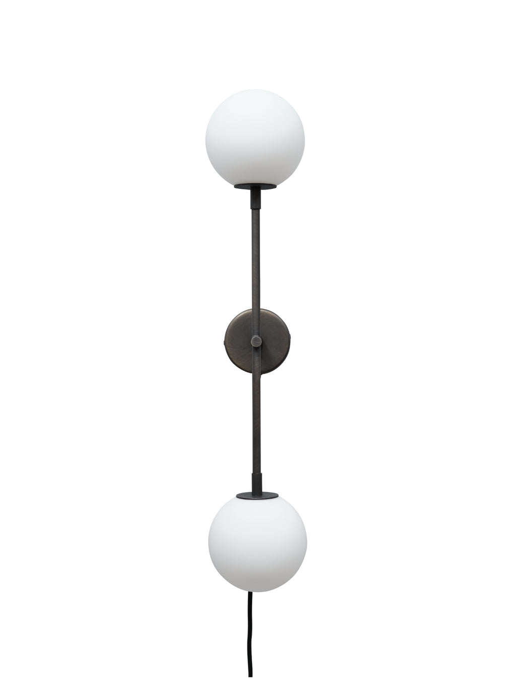 101 CPH Drop Wall Lamp featuring two pristine white spherical glass shades on a bronze-toned metal vertical rod with a circular base, showcasing its minimalist, luxury design. Ideal for modern interior lighting.