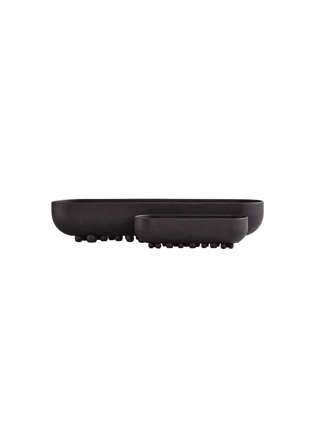 101 CPH Shinju Tray. Two dark bronze cast aluminum oval trays with textured, organic pebble-like feet, displayed side-by-side as a premium set. Ideal for sophisticated home decor.