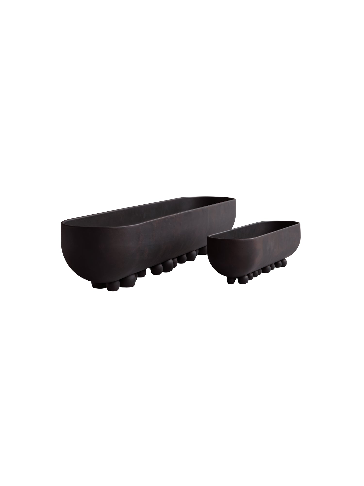 101 CPH Shinju Tray set, featuring two unique, elongated, dark brown metal trays with spherical feet on a white background. Perfect for modern interior decor.