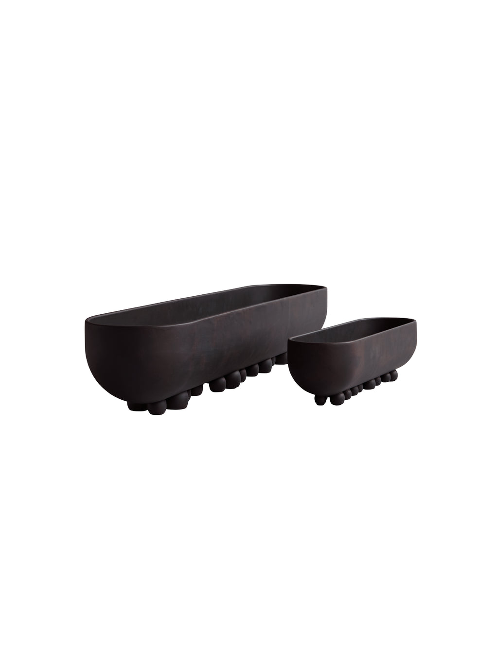 101 CPH Shinju Tray. Two dark brown, elongated oval ceramic trays, one large and one small, featuring distinctive round ball feet. Perfect for elegant decorative display.