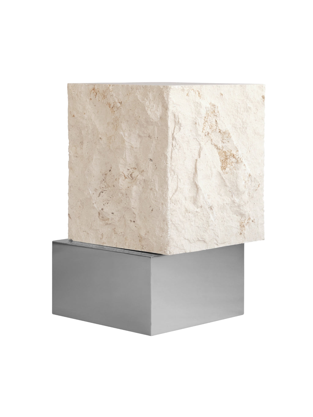 101 CPH Temple Side Table in a studio shot; a cube of light beige, textured travertine stone with natural rough edges sits atop a sleek, rectangular polished silver metal base. This luxury piece is ideal for modern interior styling.