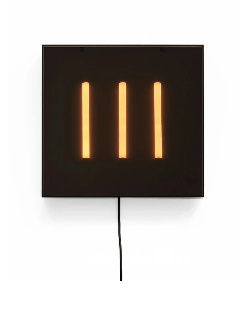 101 CPH Trois Wall Lamp, a sleek black rectangular panel with three vertical glowing orange warm light tubes, modern design. Ideal for contemporary interior spaces.