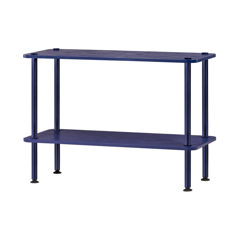noo.ma Teidi Shelving Unit 2-tier, a modern minimalist console table featuring two deep blue wood shelves with rounded corners and a subtle grain texture, supported by matching cylindrical legs with black feet. This versatile Scandinavian-inspired accent shelf is perfect for living rooms, entryways, or as a stylish small bookshelf.