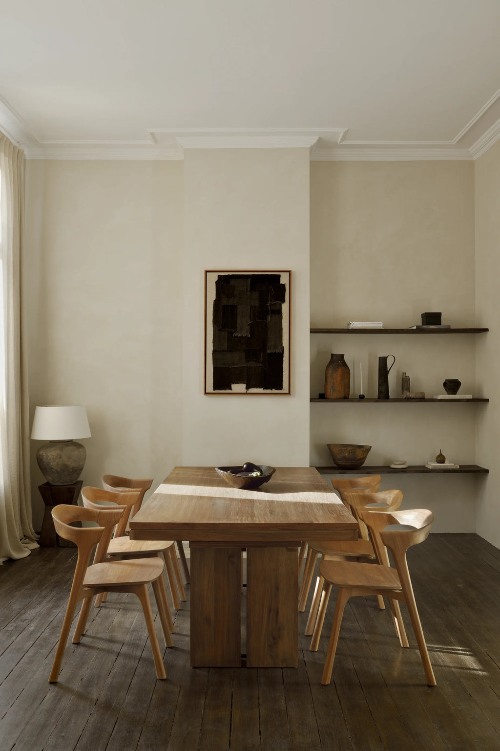 Ethnicraft Double Extendable Dining Table, a rectangular solid teak dining table crafted with a warm natural wood finish and visible grain, featuring a sturdy frame and a versatile extendable mechanism. This minimalist design is perfect for large family gatherings or everyday use in contemporary dining rooms, organic modern spaces, or Scandinavian-inspired homes.