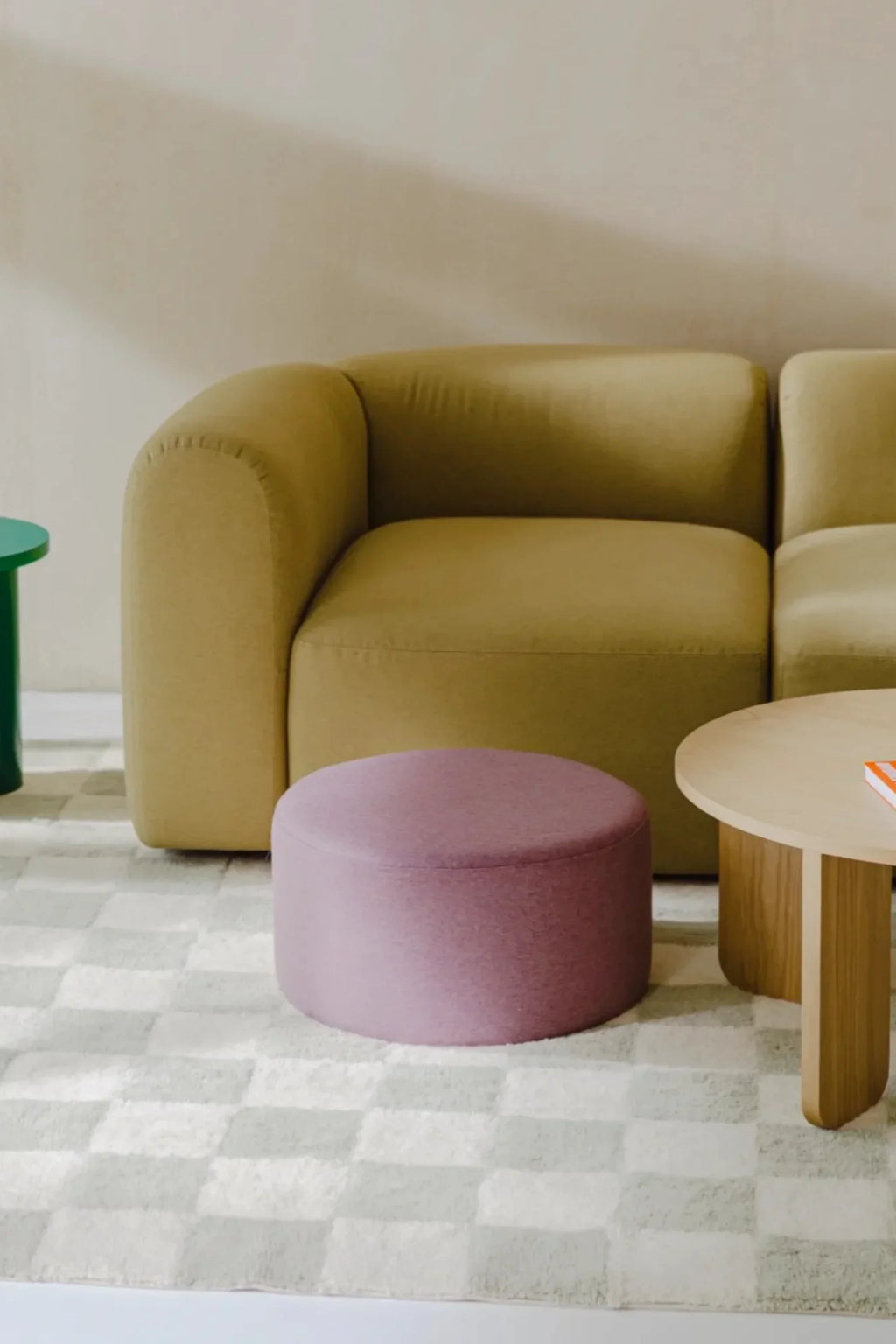 noo.ma Flom 2-Seater Sofa, a compact contemporary sofa upholstered in a warm mustard yellow fabric with a plush, inviting texture and soft, rounded organic contours.