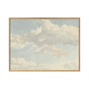 Beautiful sunset over the ocean with Clouds IV painting in the foreground