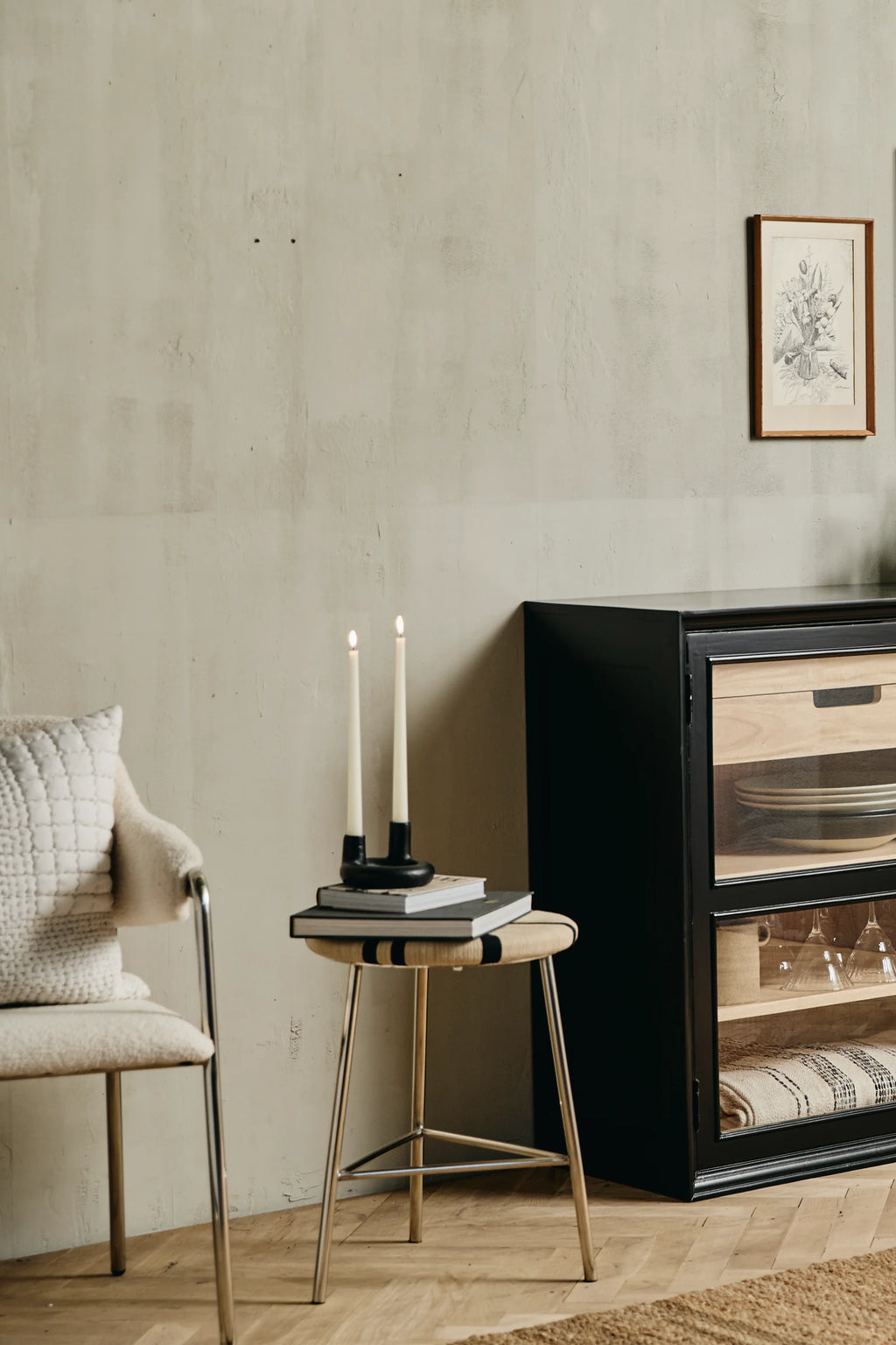 Nordal Morice Stool, a modern minimalist accent stool featuring a round hand-woven natural fiber seat with bold black stripes, supported by sleek silver chrome metal tripod legs. This versatile design piece is ideal for Scandinavian living rooms, bedrooms, or as a contemporary side table for stylish interiors.