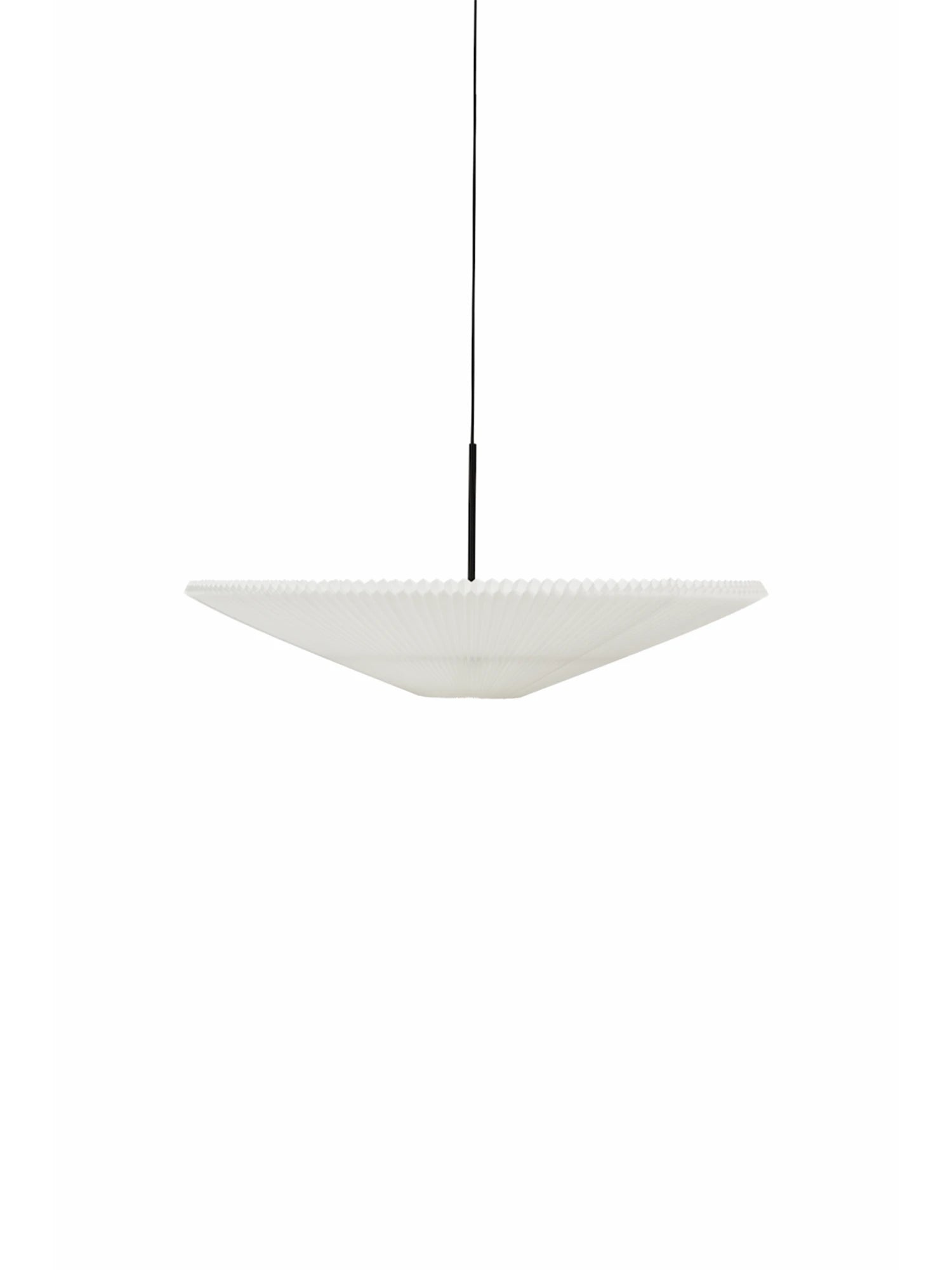 New Works Nebra Pendant Lamp, a striking white pleated pendant light with a wide, shallow, inverted cone silhouette and a delicate ribbed texture, suspended by a contrasting black cord. This modern minimalist design provides soft, diffused illumination, making it ideal as a Scandinavian ceiling lamp for living rooms, dining areas, or contemporary bedrooms.
