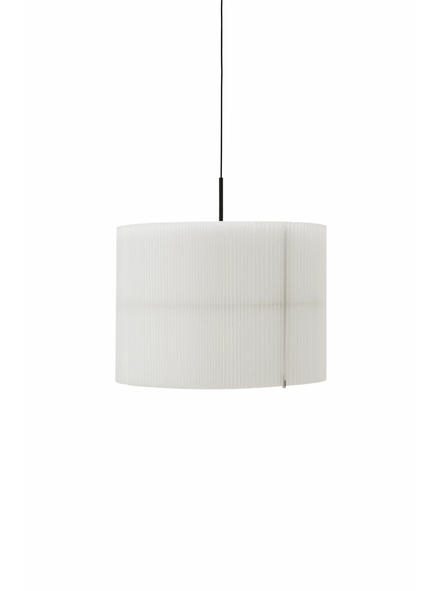 New Works Nebra Pendant Lamp, a modern minimalist ceiling light featuring a white pleated cylindrical shade with a subtle ribbed texture, suspended by a sleek black cord. This contemporary hanging lamp provides soft, diffused illumination, perfect for Scandinavian living rooms, Japandi dining areas, or minimalist bedrooms.