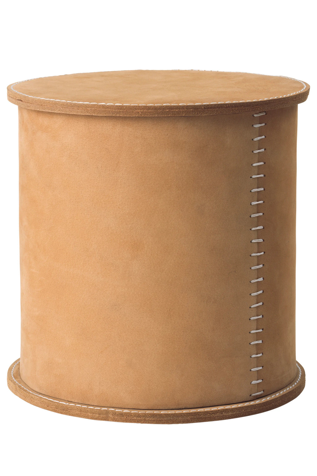 Kristina Dam Stitched Leather Box, a cylindrical tan natural leather storage box with a soft, suede-like texture. It features distinctive white hand-stitching along the top and bottom edges and a vertical seam, adding a handcrafted, modern minimalist aesthetic. Ideal as stylish decorative storage, a small side table, or a unique bedside accent for Scandinavian or organic modern interiors.