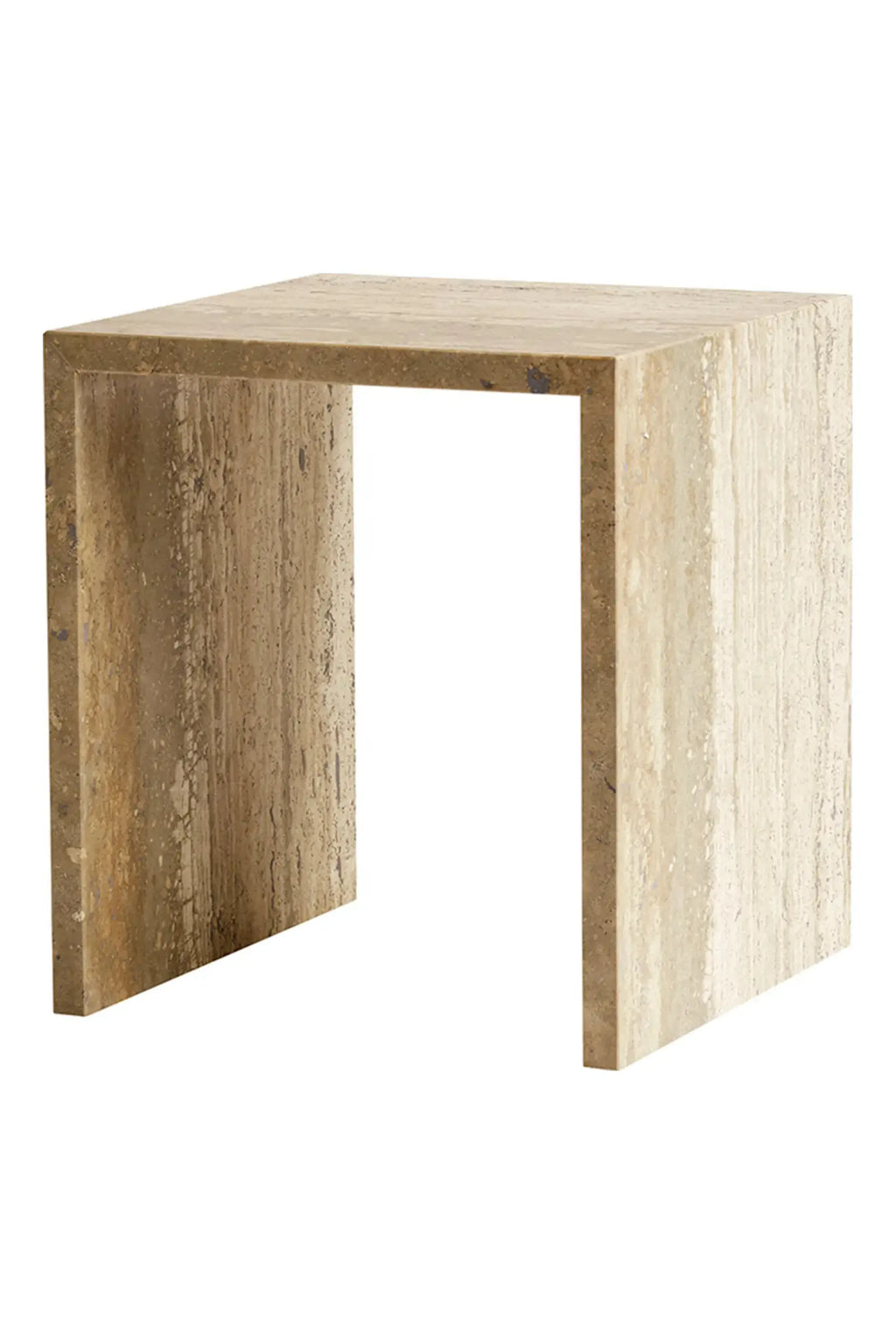 Tine K Cube Travertine Table, a modern minimalist side table crafted from natural beige travertine stone with a distinctive porous texture and earthy veining. Its blocky, U-shaped silhouette offers a contemporary brutalist aesthetic, perfect for a living room accent, bedroom nightstand, or entryway console table.