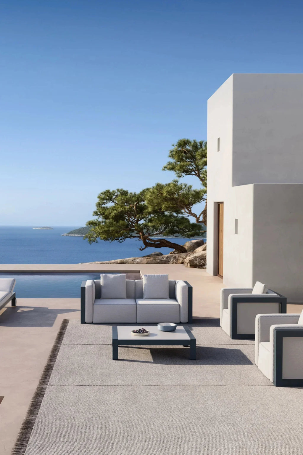 Gandia Blasco Islablanca Outdoor Pouf, a sleek modern modular outdoor sofa system featuring light grey woven outdoor fabric upholstery with plush cushions and a distinctive anthracite matte metal frame.
