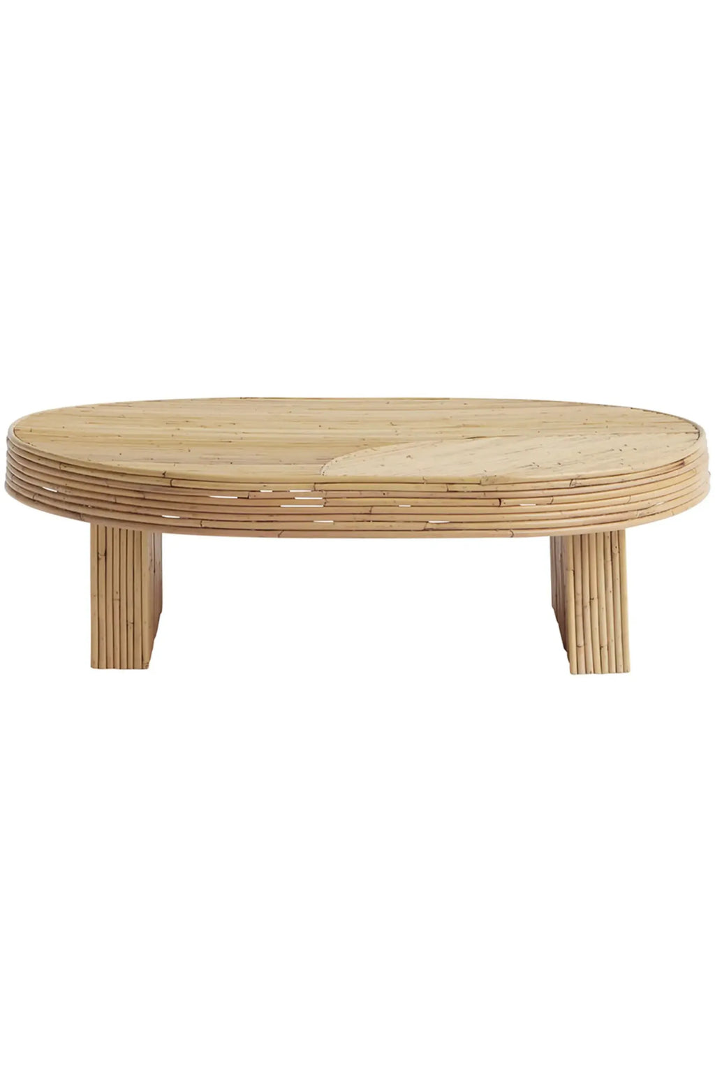 Tine K Viva Rattan Table, a natural rattan coffee table featuring an oval-shaped top constructed from parallel rattan strips, with a distinctive side profile made of horizontally stacked rattan poles. Its sturdy, rectangular block legs are crafted from vertically arranged natural bamboo poles, showcasing a light, blonde wood tone and organic texture. This coastal-inspired coffee table is perfect for boho living rooms, organic modern spaces, or adding a touch of Scandinavian warmth to any interior.