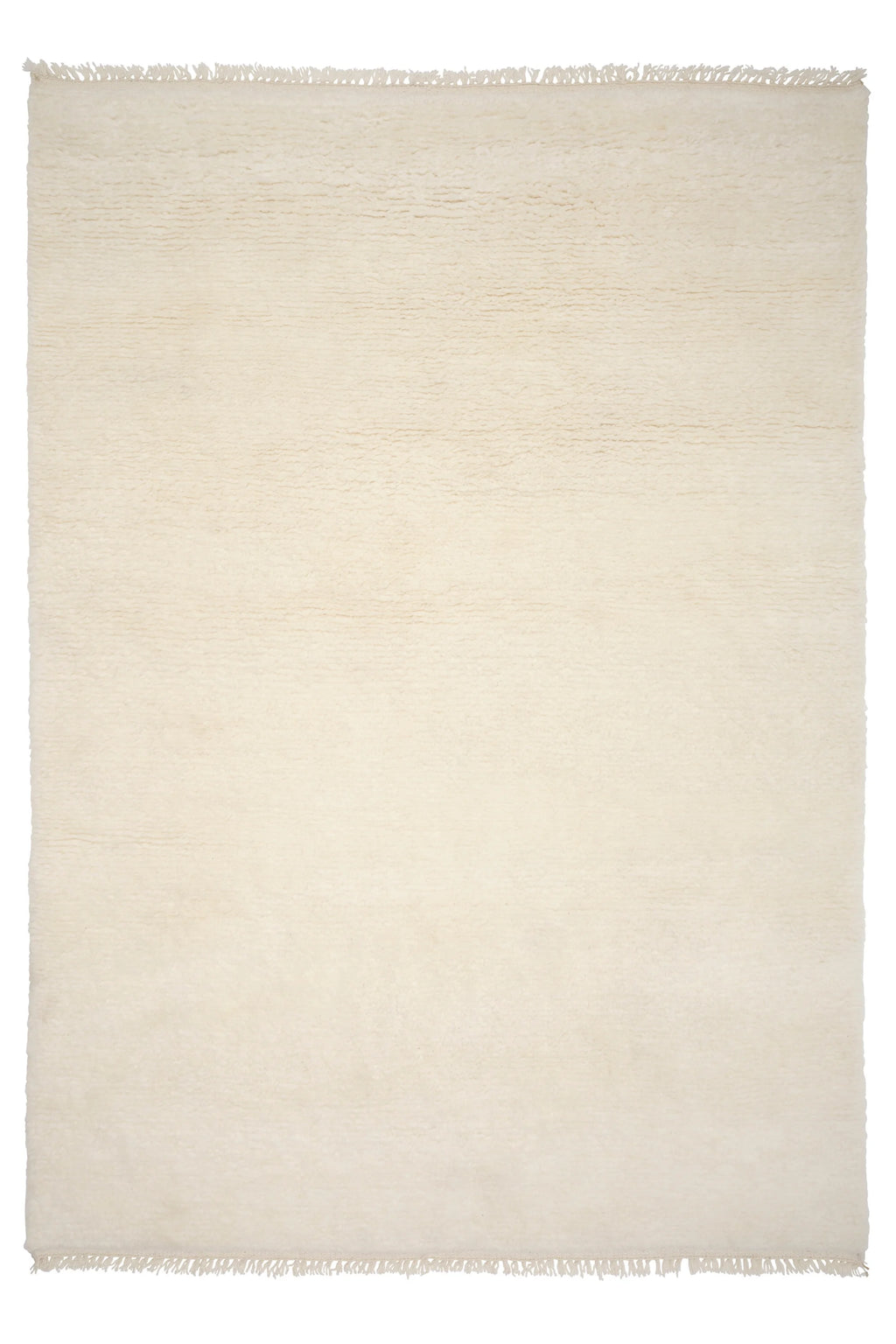 Linie Design Soft Savannah Wool Rug, a plush cream wool area rug featuring a thick, soft pile and subtle textured weave in a natural off-white hue with delicate fringed edges. This luxurious Scandinavian-style rug is perfect for adding cozy warmth to modern minimalist living rooms, serene bedrooms, or organic modern interiors.