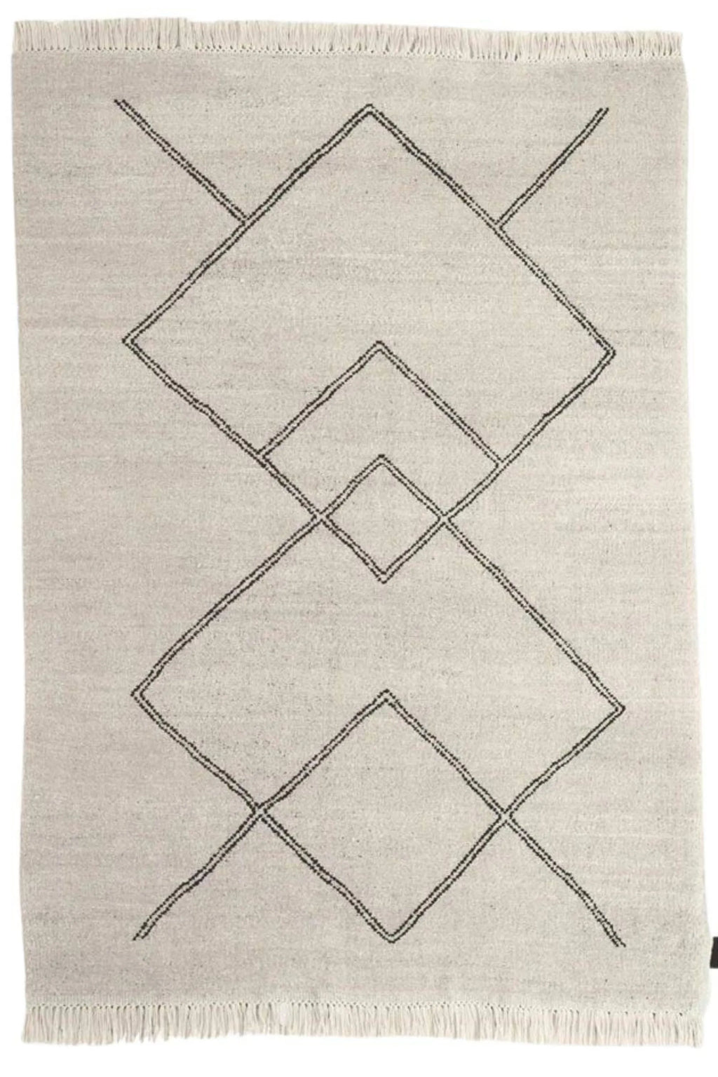 Sera Helsinki Kide Rug, a hand-woven wool flatweave area rug in a natural undyed cream color, featuring a striking dark grey geometric pattern of interlocking diamonds and zigzags, finished with delicate fringe. This Scandinavian-inspired modern minimalist rug is perfect for adding subtle texture and graphic interest to contemporary living rooms, bedrooms, or entryways.