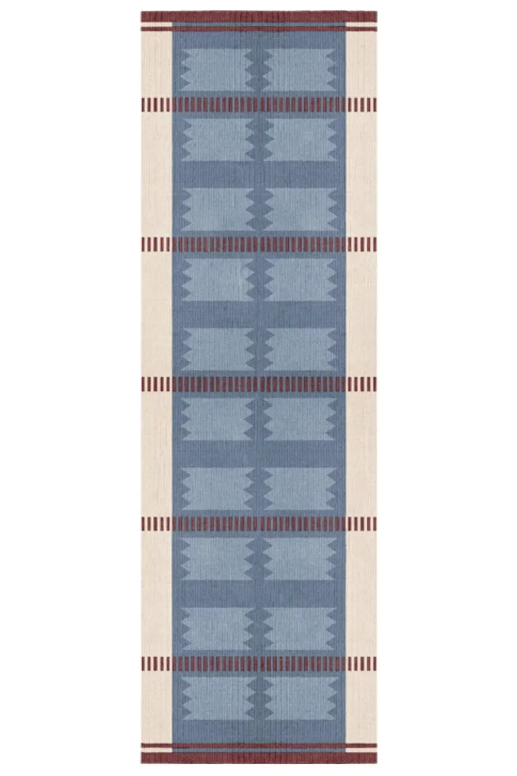 Layered Iris Wool Rug, a rectangular woven carpet featuring a central blue panel with lighter blue geometric zigzag patterns, flanked by off-white borders and thin reddish-brown horizontal stripes....