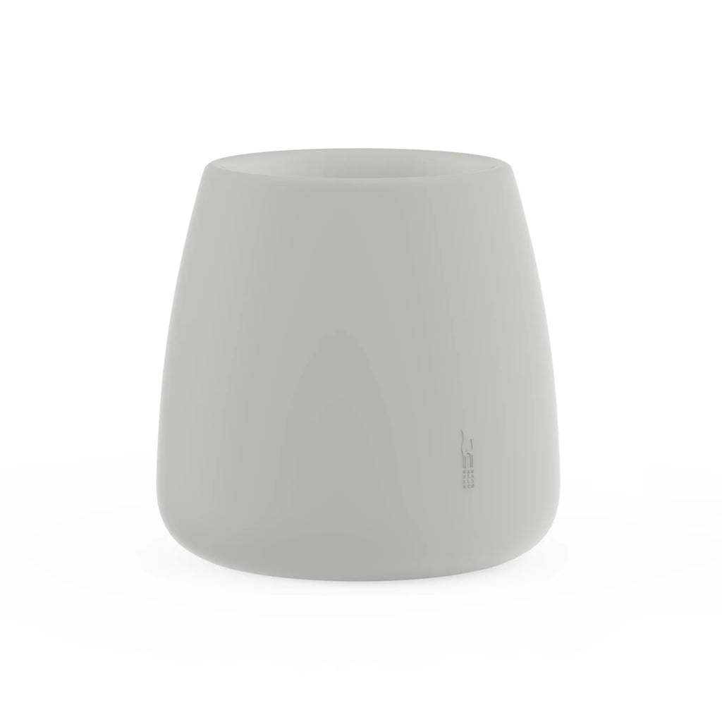 Gandia Blasco Sahara Outdoor Planter 1, a sleek modern minimalist outdoor planter crafted from durable matte grey polyethylene with a smooth finish and an elegant tapered, rounded silhouette. This contemporary outdoor pot offers an organic modern aesthetic, designed to withstand elements and bring sophisticated style to any patio, garden, or commercial landscape.