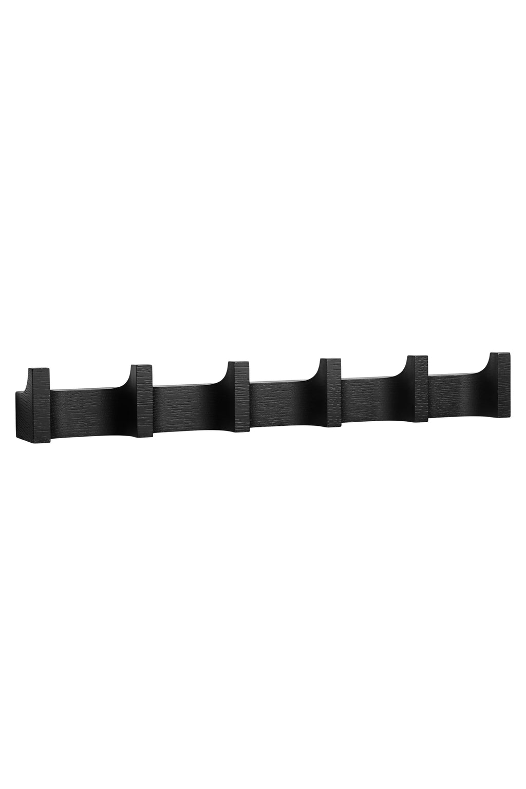 Kristina Dam Long Column Coat Rack, a matte black solid oak wall hanger featuring five integrated curved column hooks and a visible wood grain texture. This modern minimalist and sculptural design is perfect for contemporary entryways, Scandinavian hallways, or brutalist-inspired living spaces.