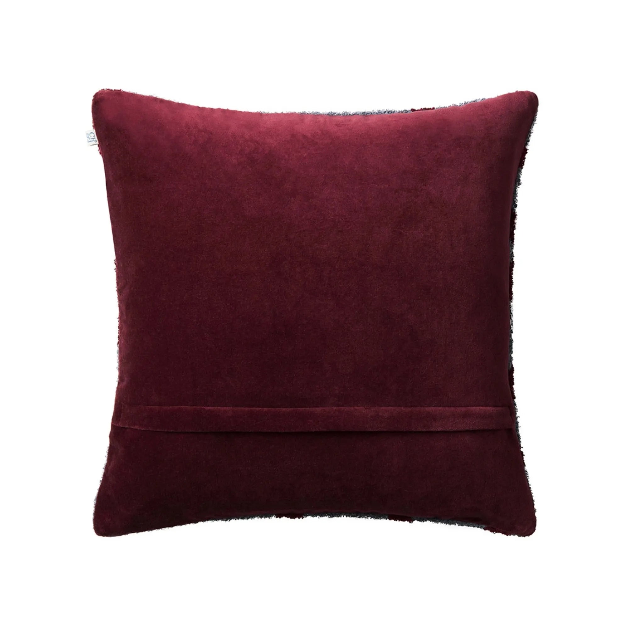 Decorative cushion pillow with textured boucle fabric in dusty blue and ruby
