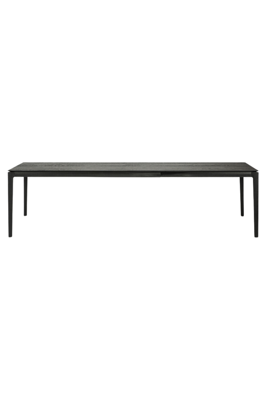 Ethnicraft Bok Extendable Dining Table, a sleek modern minimalist dining table crafted from dark solid oak with a visible wood grain and an innovative extendable design. Its clean lines, slim rectangular tabletop, and subtly tapered legs offer a contemporary Scandinavian aesthetic. Perfect as a versatile dining room table for everyday use and entertaining in modern or japandi interiors.
