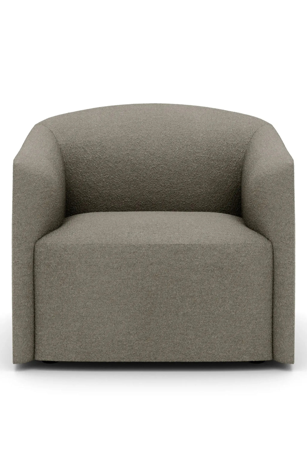 New Works Shore Lounge Chair - Extended Base, a modern minimalist lounge chair featuring a warm greige textured bouclé fabric upholstery and a distinctive curved, organic profile with integrated arms and a low, extended base. This contemporary accent chair is perfect for Scandinavian living rooms or cozy reading nooks.
