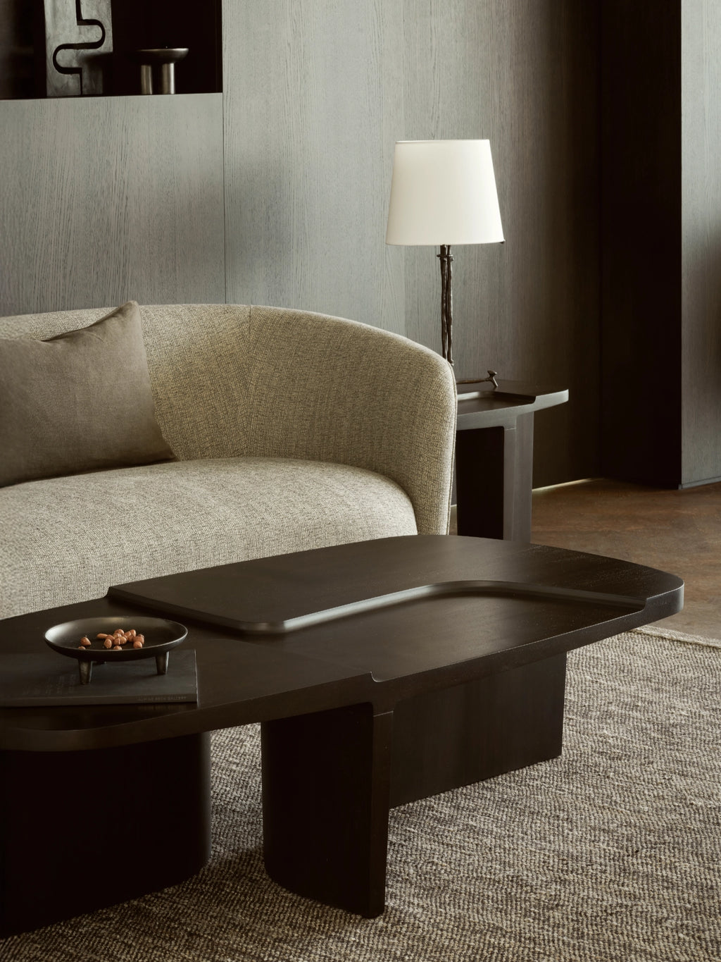 Ethnicraft Brutalist Coffee Table, a dark solid wood coffee table with a bold, sculptural brutalist design and a rich, almost black finish.