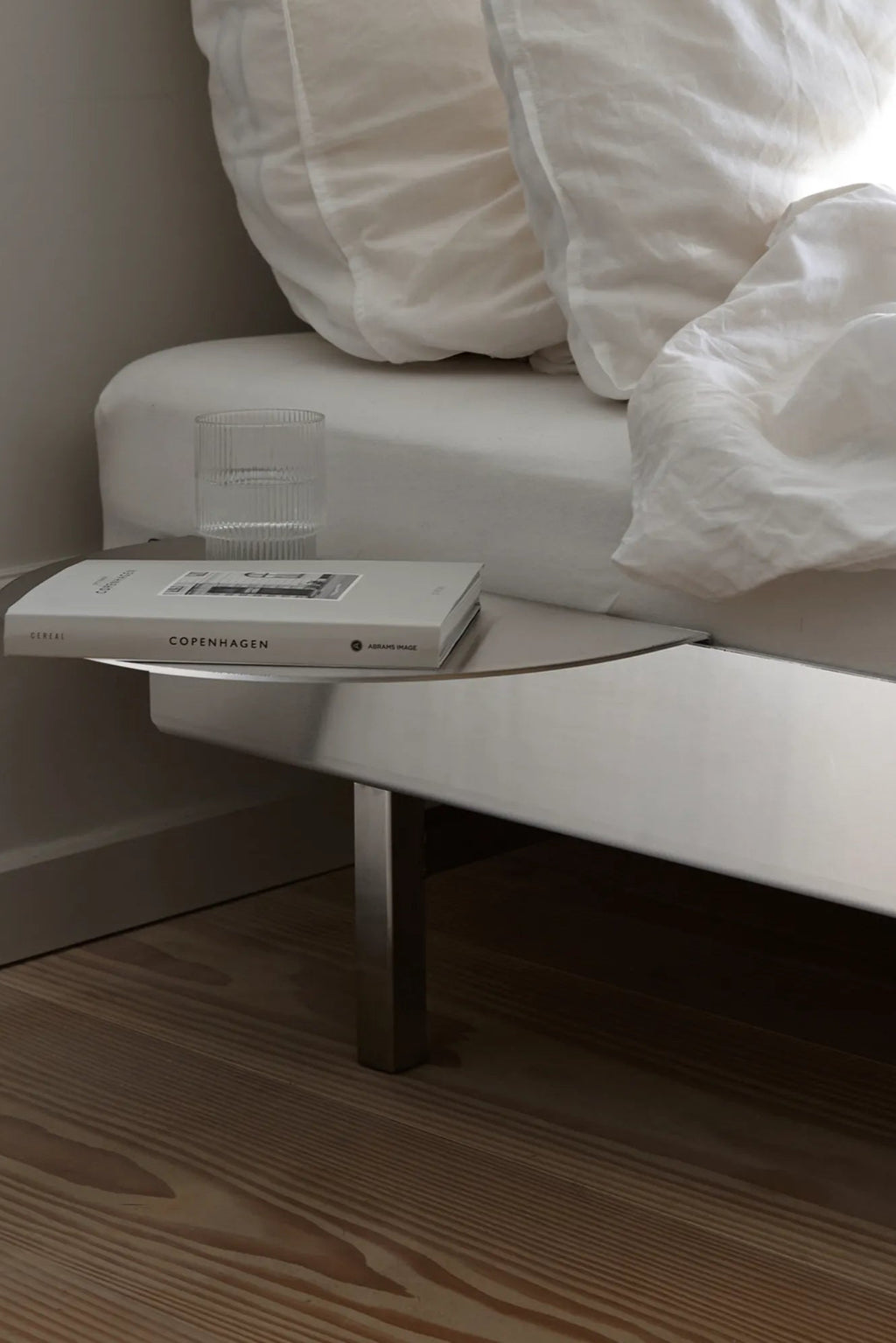  Elegant and modern stainless steel bed with adjustable headboard and built-in storage
