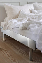  Luxurious stainless steel bed with comfortable mattress and stylish headboard
