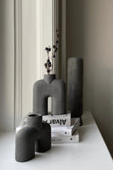 Handcrafted ceramic mini Uno Cobra vase with unique design and texture