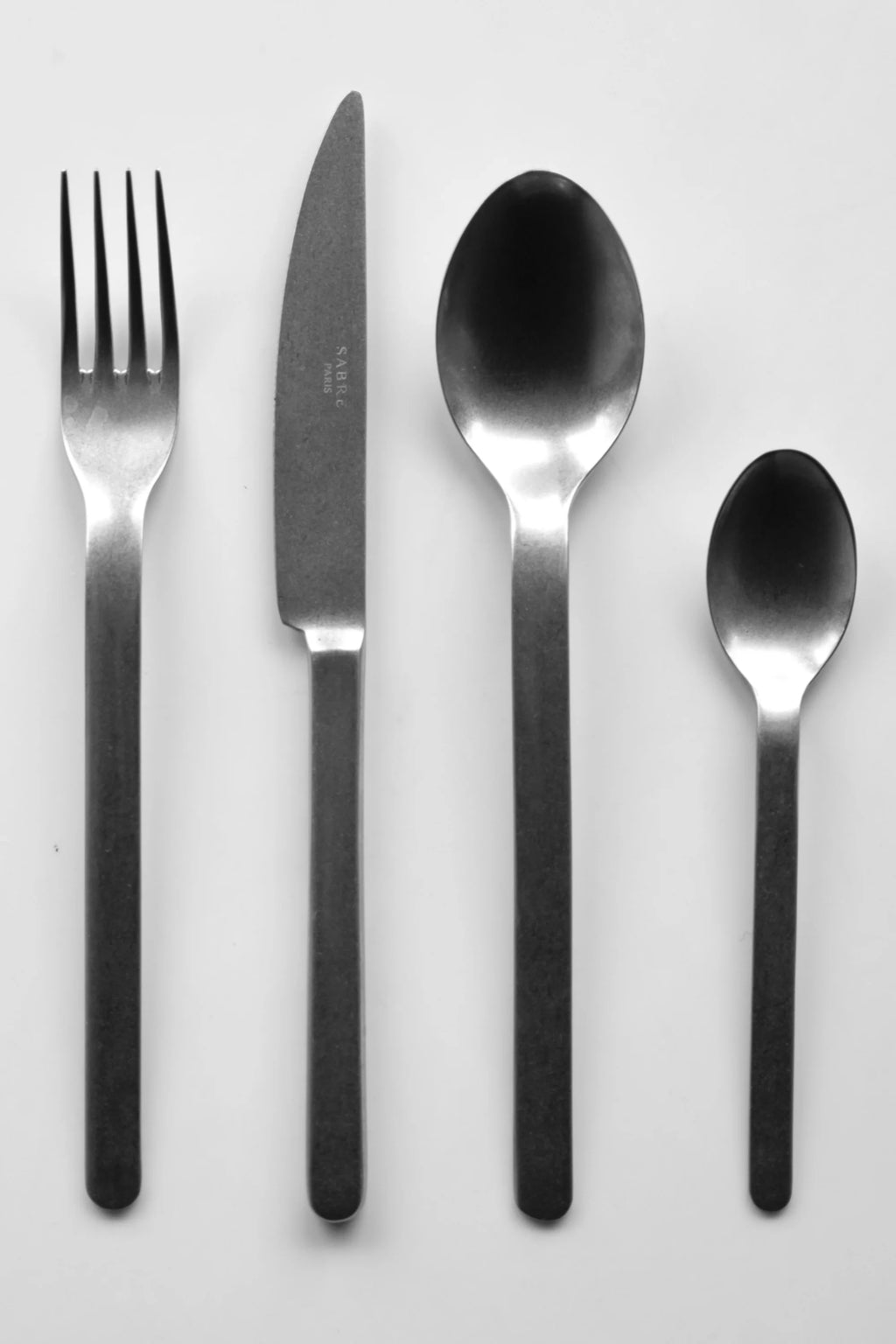 Sabre Paris Loft Vintage Cutlery Set, featuring a brushed matte stainless steel finish with clean, minimalist lines. This durable and stylish flatware is perfect for modern dining, adding a touch of industrial chic to any table setting.